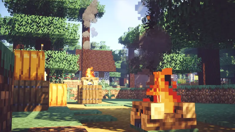 A campfire and stacked barrels outside a forest cottage